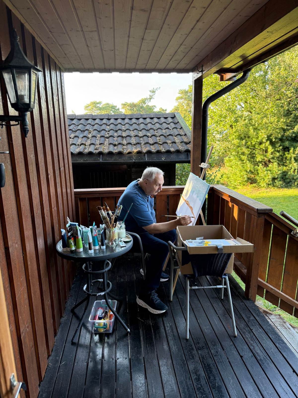 Der Maler bei der Arbeit